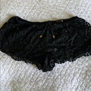 Black swimsuit cover-up shorts.